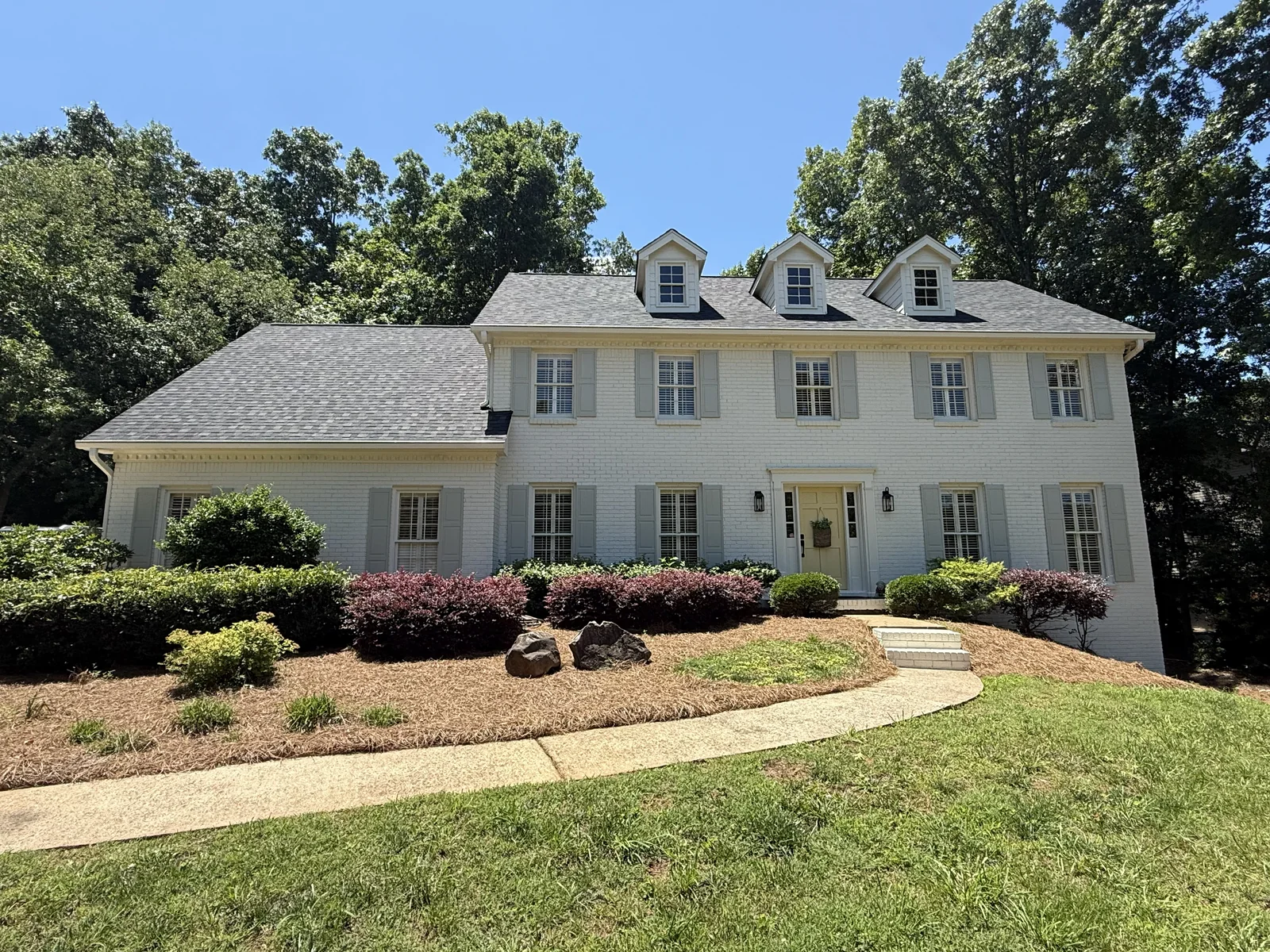 After new James Hardie siding, corner boards, and painted brick exterior in Marietta
