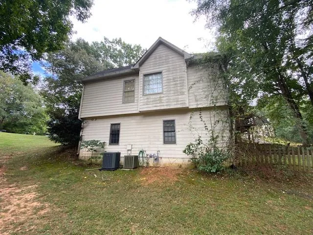 Before residential exterior painting project in Powder Springs