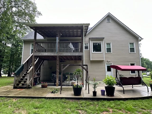 Before siding and trim project in Powder Springs