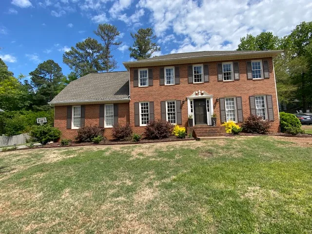 Before siding and exterior color refresh in Marietta