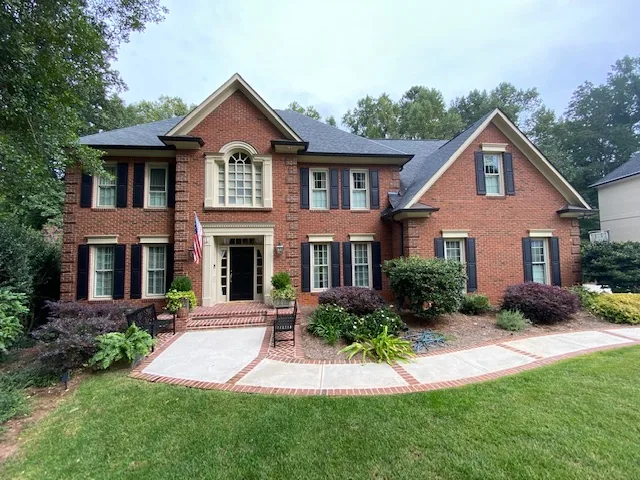 Before residential exterior home painting project in Marietta